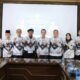 Anggota LKBH PB PGRI, Drs. Siswaji, M.Pd., memberikan keterangan kepada wartawan di Gedung Guru Palembang, Minggu (28/6/2026). Ia menegaskan sengketa legalitas badan hukum PB PGRI telah berkekuatan hukum tetap (inkracht), sehingga kepengurusan yang sah harus berpedoman pada SK AHU yang diakui negara. Foto: Dok. opsi.co.id