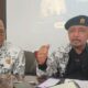 Anggota Lembaga Konsultasi dan Bantuan Hukum (LKBH) PB PGRI, Drs. Siswaji, M.Pd., didampingi Wakil Ketua I PGRI Provinsi Sumatera Selatan, Drs. H. Lukman Haris, M.Si., memberikan keterangan kepada wartawan terkait kepastian hukum legalitas badan hukum PB PGRI di Gedung Guru Palembang, Minggu (28/6/2026). Foto: Dok. opsi.co.id
